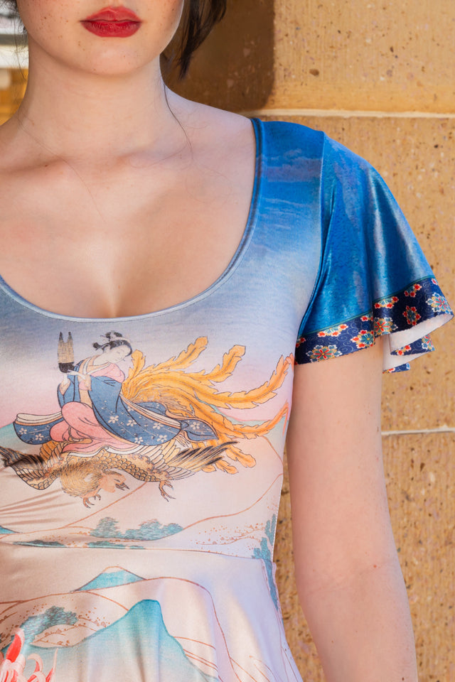 Women’s scoop neck skater dress featuring flutter sleeves, fitted bodice and golden phoenix artwork with floral detailing
