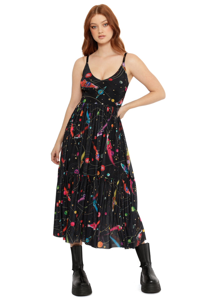 Model styled in Fallout x BlackMilk Nuka-Space Dress showcasing rocket ship pattern, orbit lines and cosmic Fallout design.